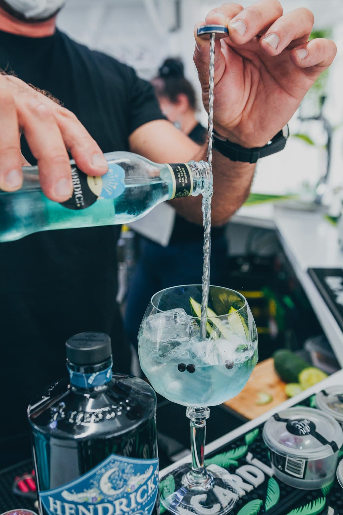 Bartender plating a premium service detail